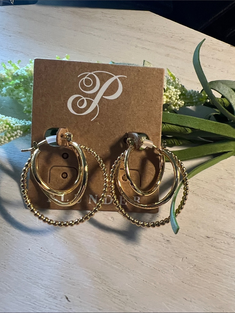 Plunder gold tone hoop earrings